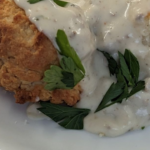 Detail of biscuits and gravy.