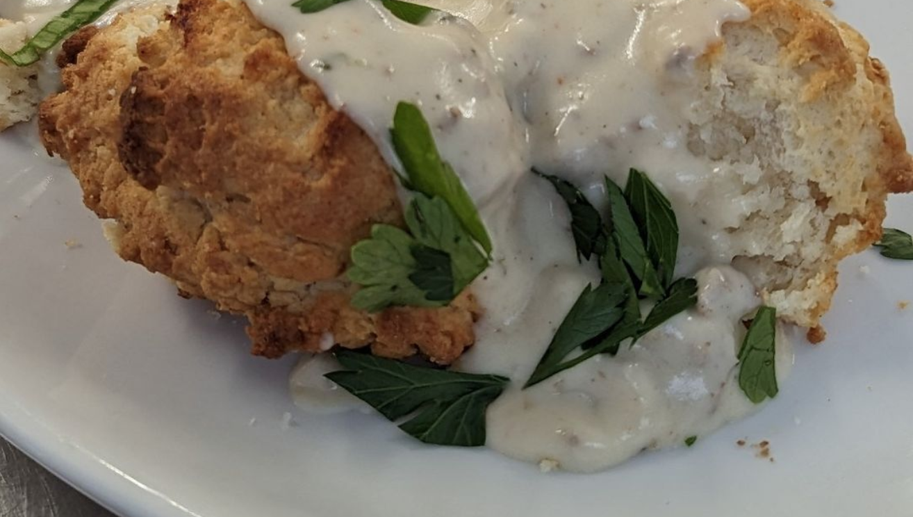 Detail of biscuits and gravy.