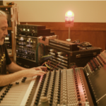 Producer Kevin Moloney at a mixing console.